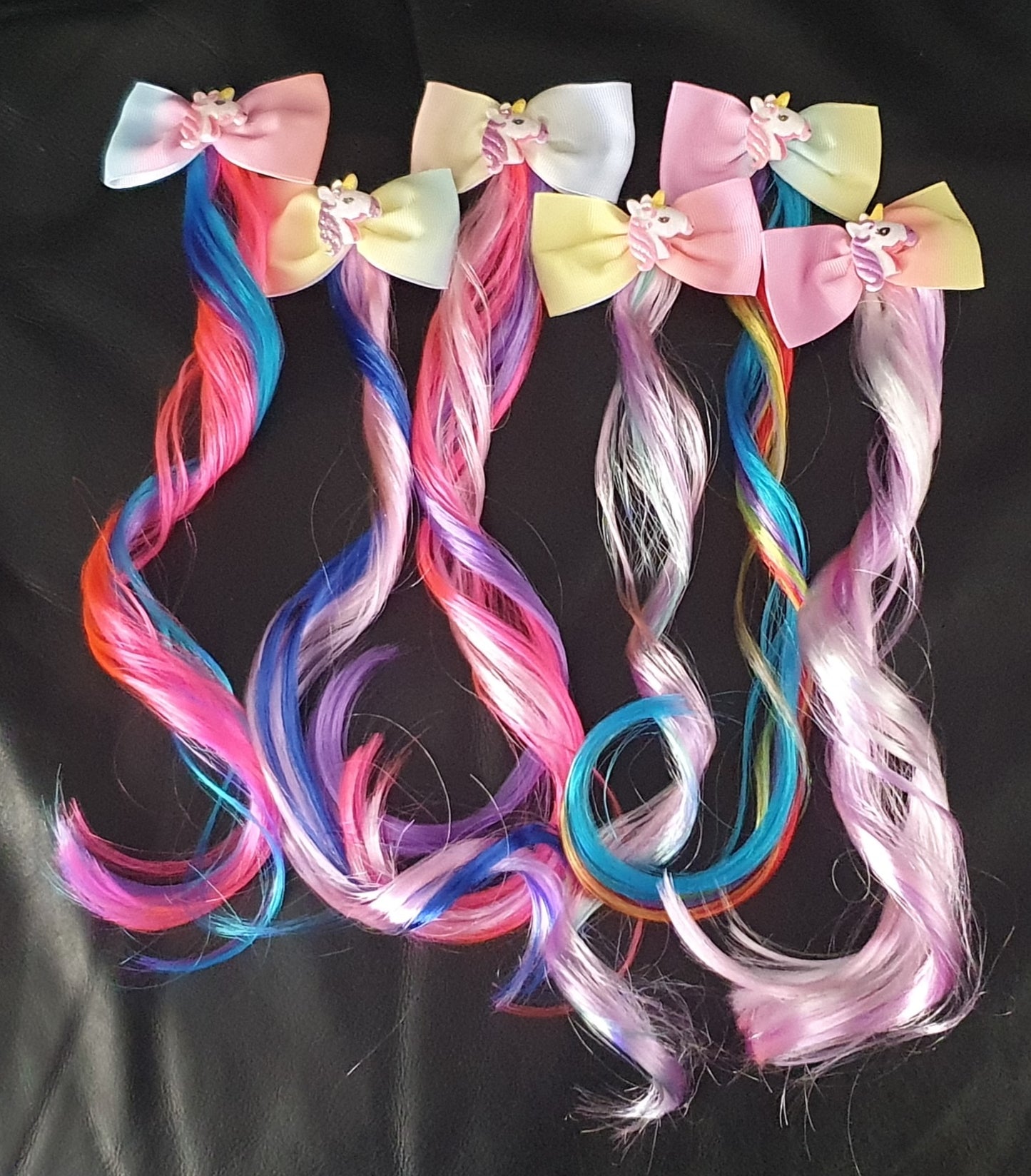 Pastel rainbow bow with unicorn and coloured hair extension