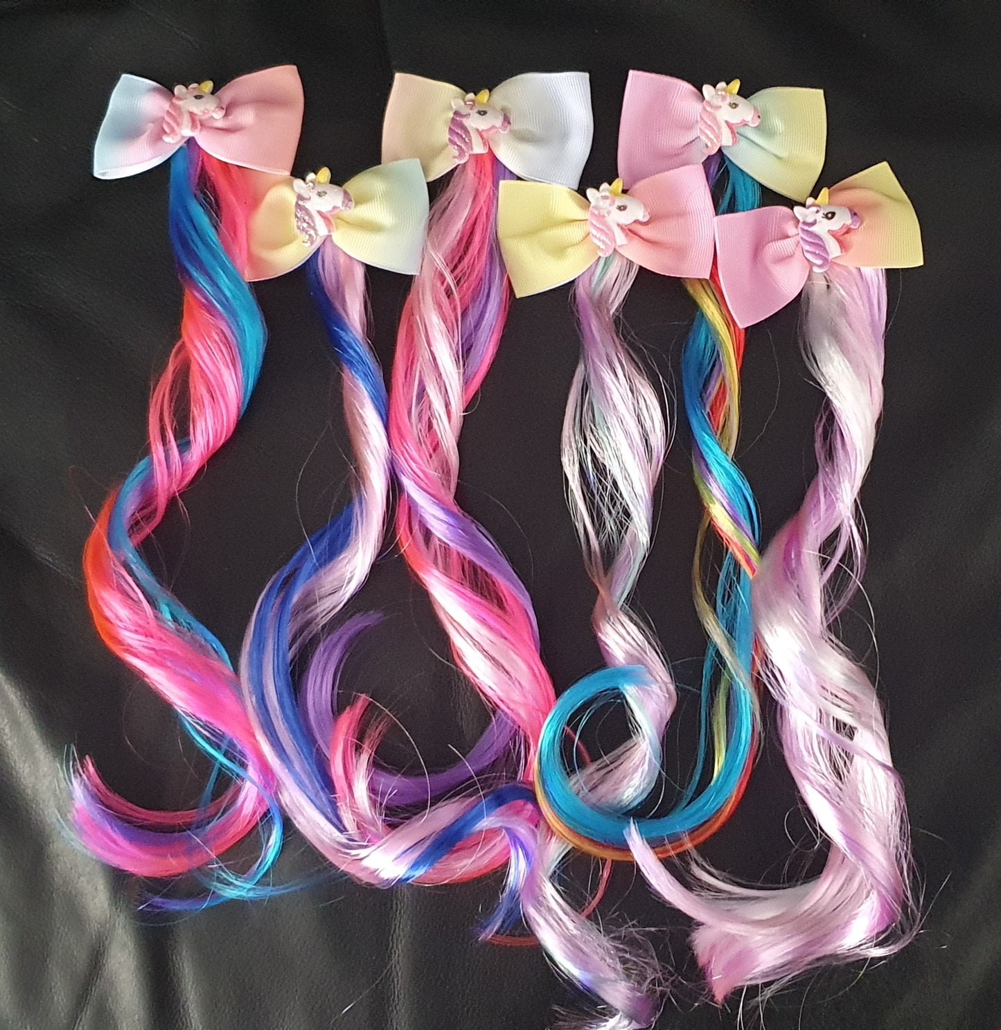 Pastel rainbow bow with unicorn and coloured hair extension