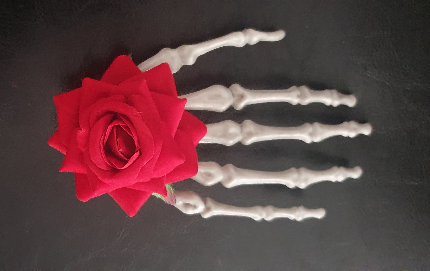 Large skeleton hand with rose hair clip