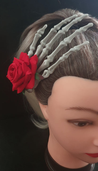 Large skeleton hand with rose hair clip