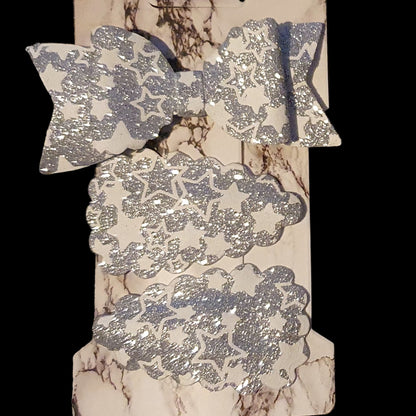 Shimmery star print bow and snap clip set