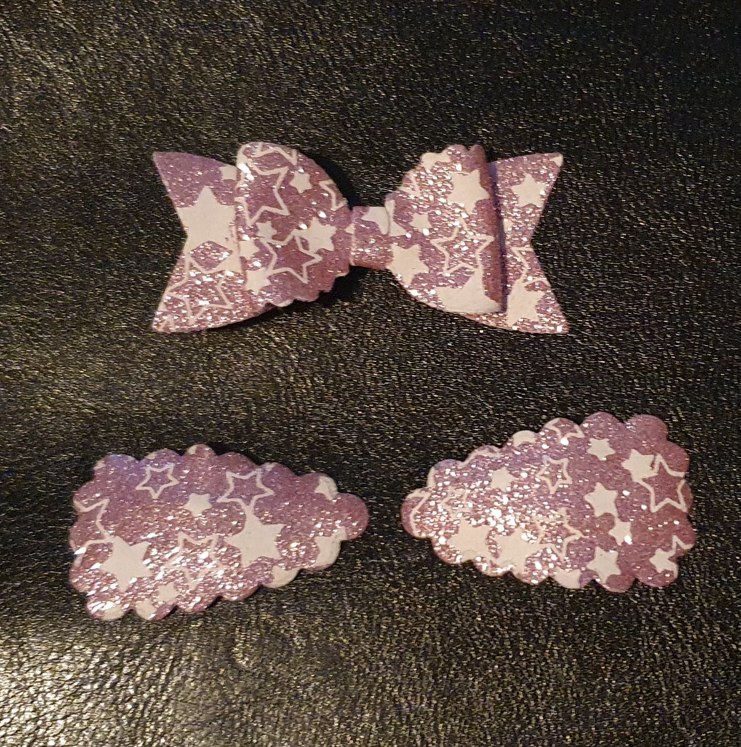 Shimmery star print bow and snap clip set