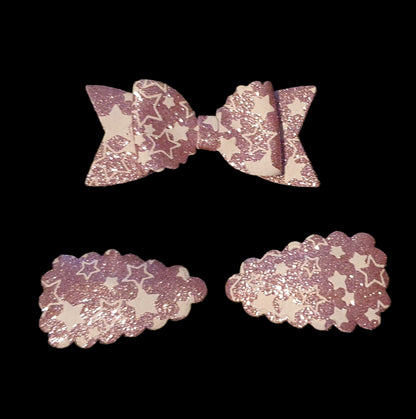 Shimmery star print bow and snap clip set
