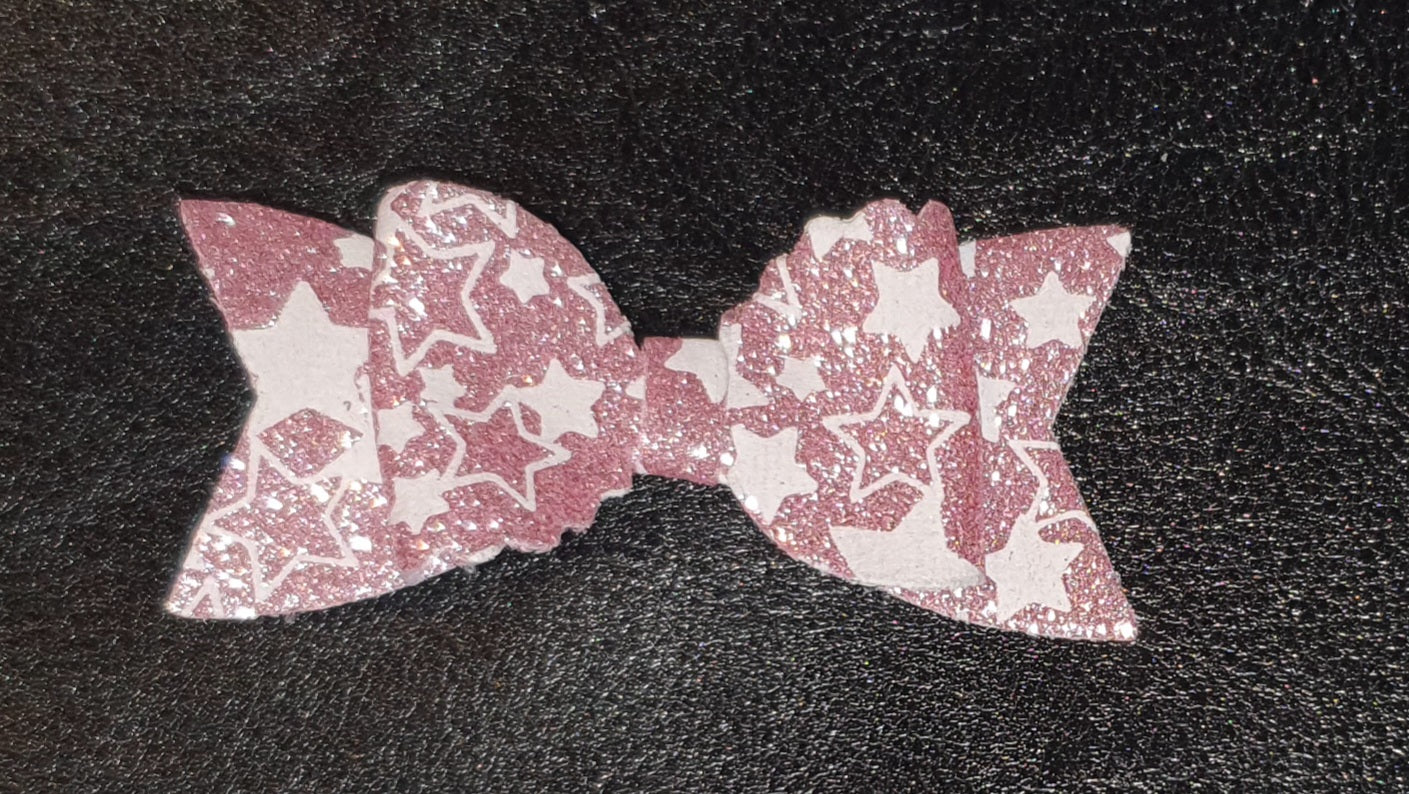 Shimmery star print bow and snap clip set