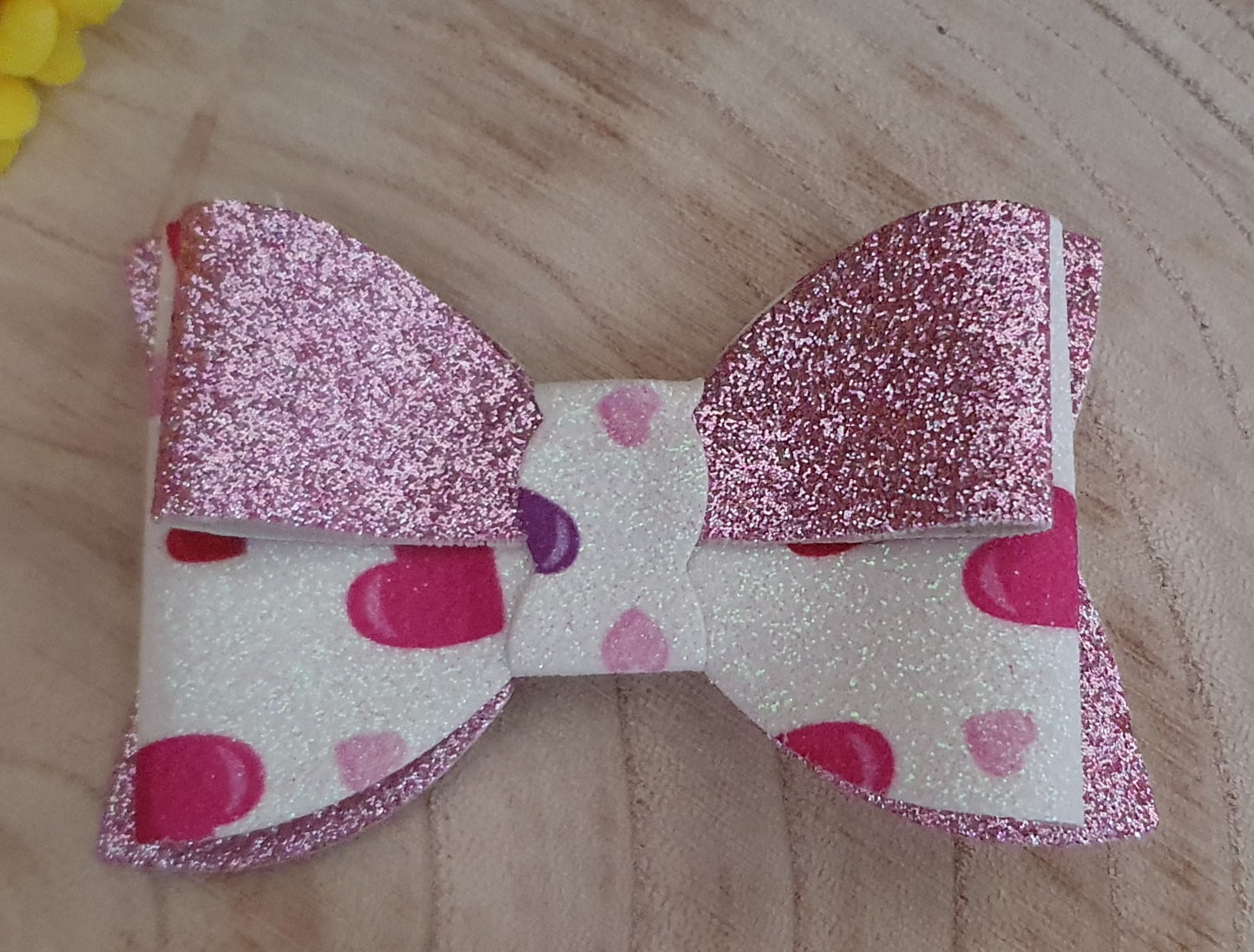 Pink shimmer heart hair bow