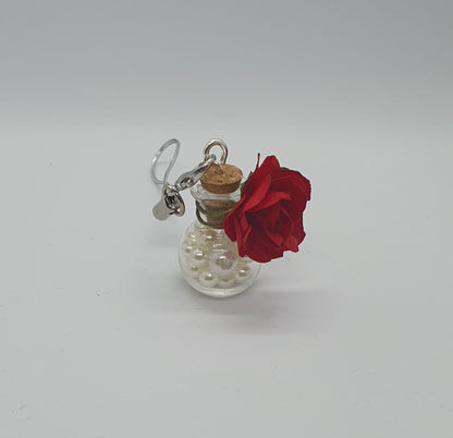 Glass potion bottle with faux pearl beads and rose keepsake charm