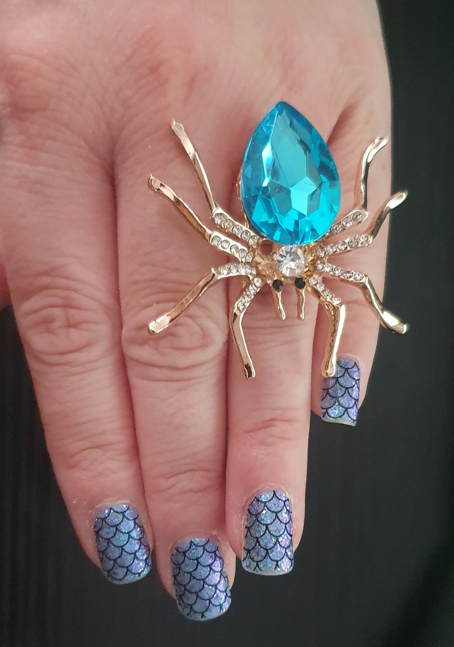 Metal spider gemmed adjustable ring