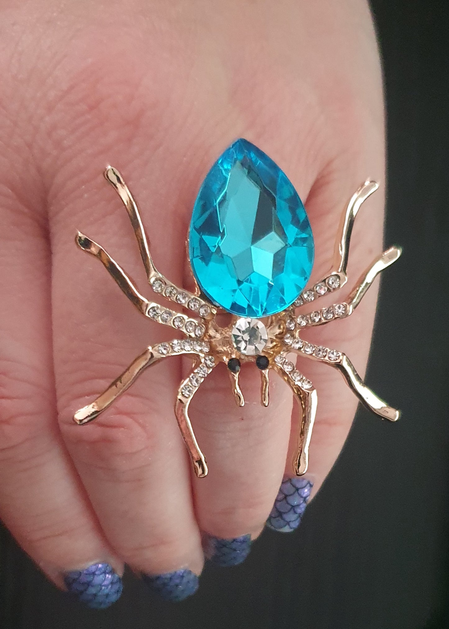 Metal spider gemmed adjustable ring