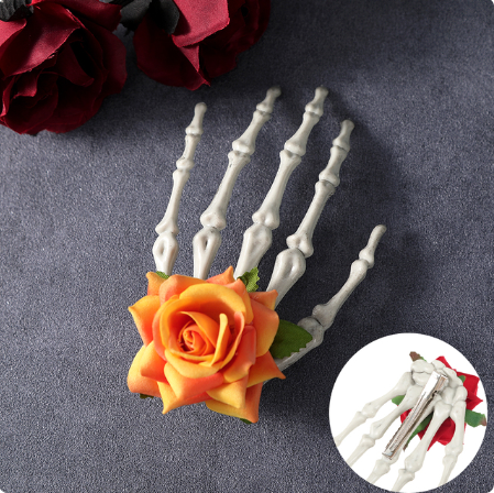 Large skeleton hand with rose hair clip