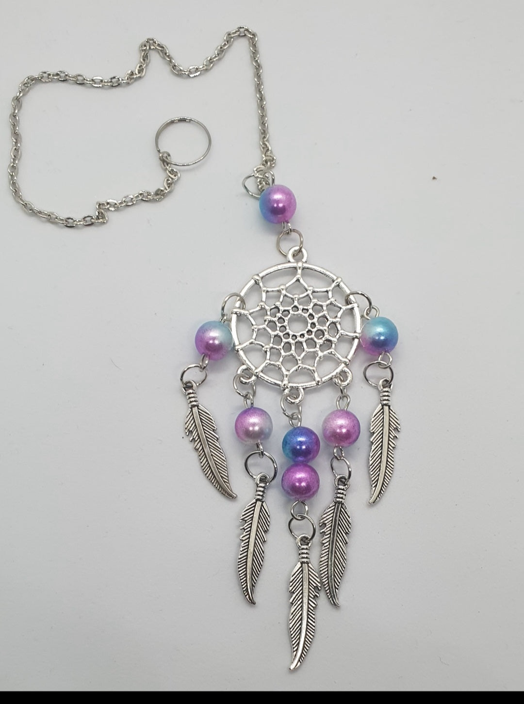 Dream catcher hanging ornament with beads and feather detail