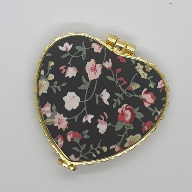 Hand held floral mirror for bags and purses