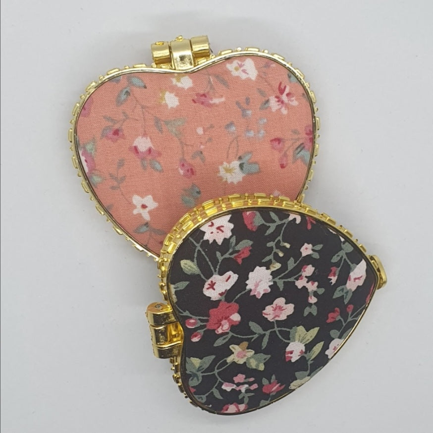 Hand held floral mirror for bags and purses