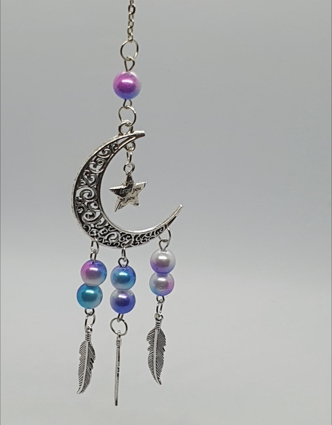 Moon and star love you hanging ornament with beads and feather detail