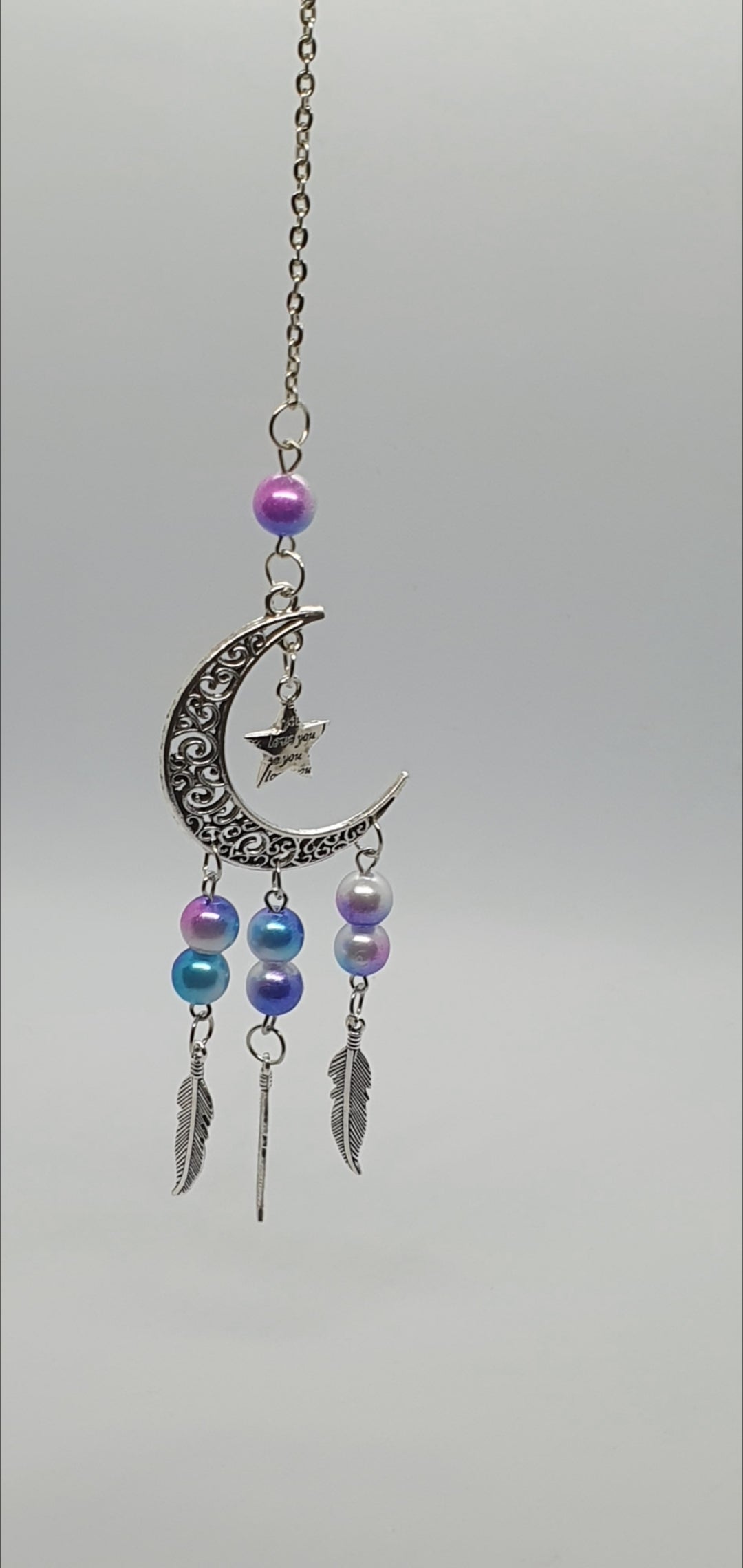 Moon and star love you hanging ornament with beads and feather detail