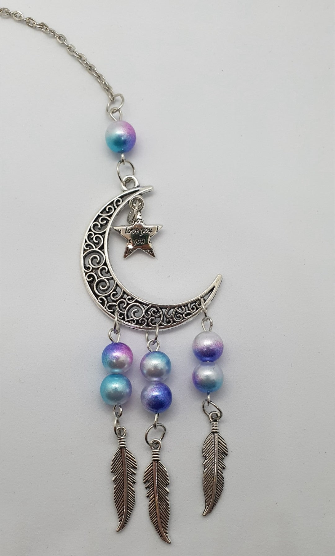 Moon and star love you hanging ornament with beads and feather detail