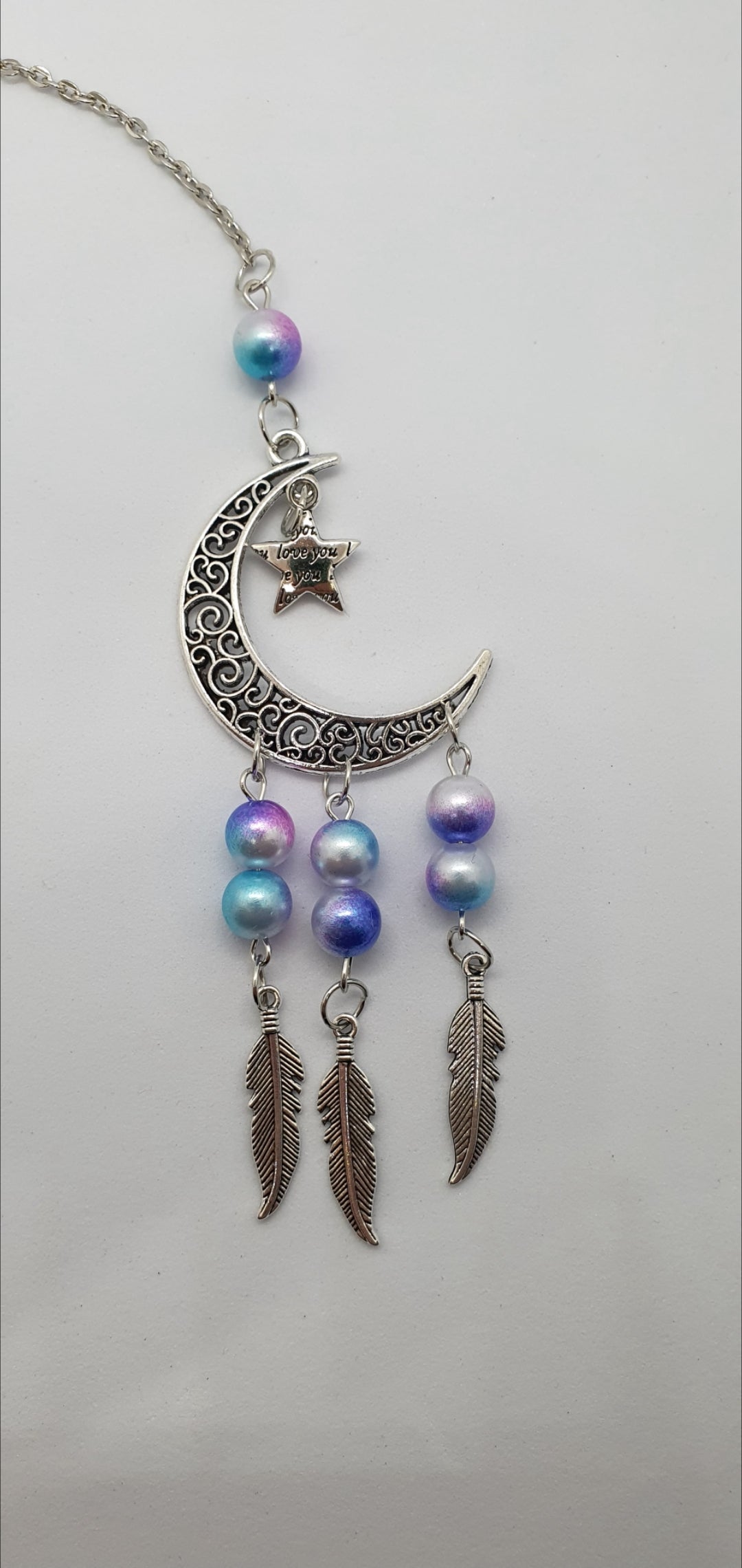 Moon and star love you hanging ornament with beads and feather detail