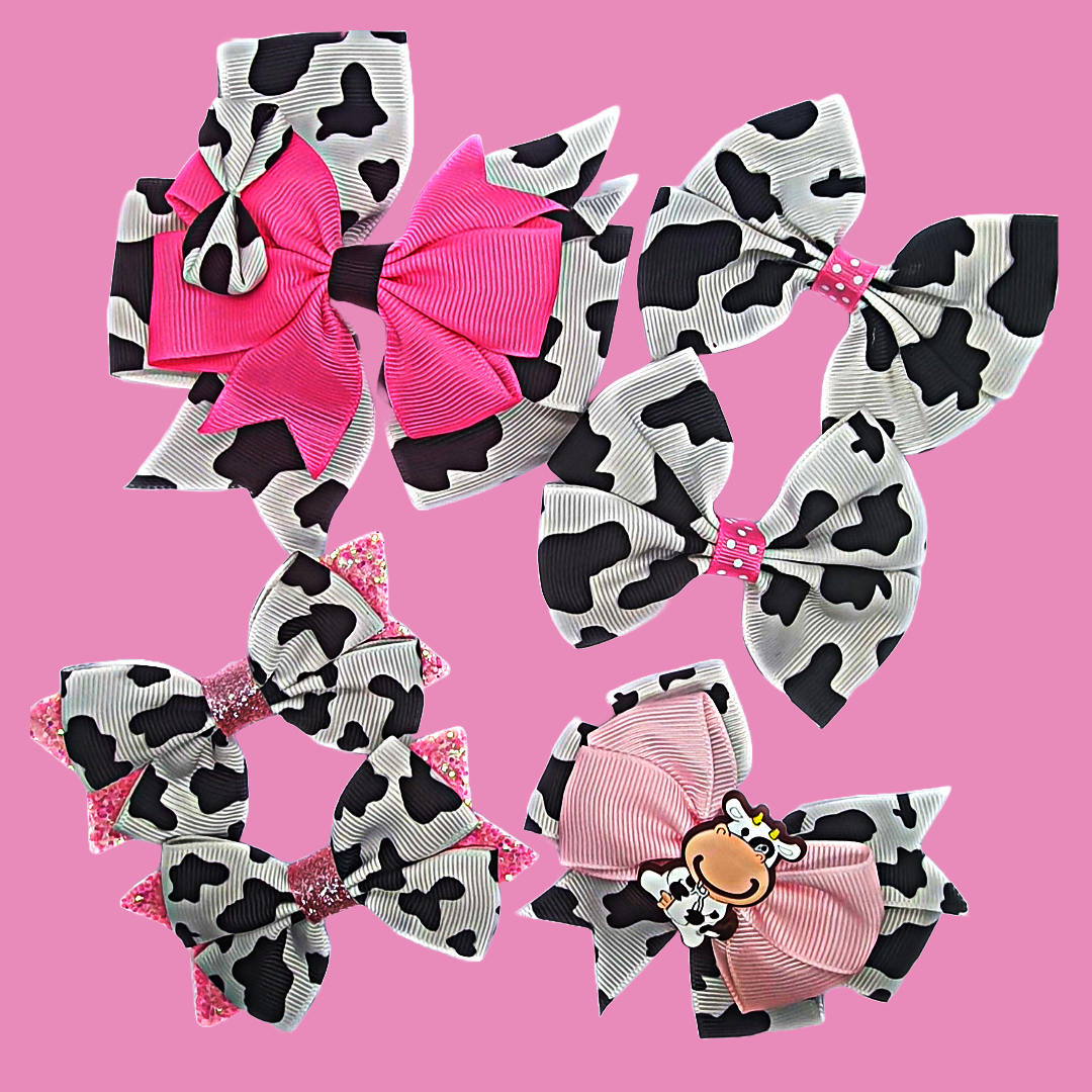 Cow print and pink ribbon bow hair clip set