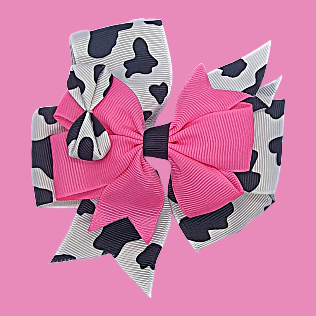 Cow print and pink ribbon bow hair clip set