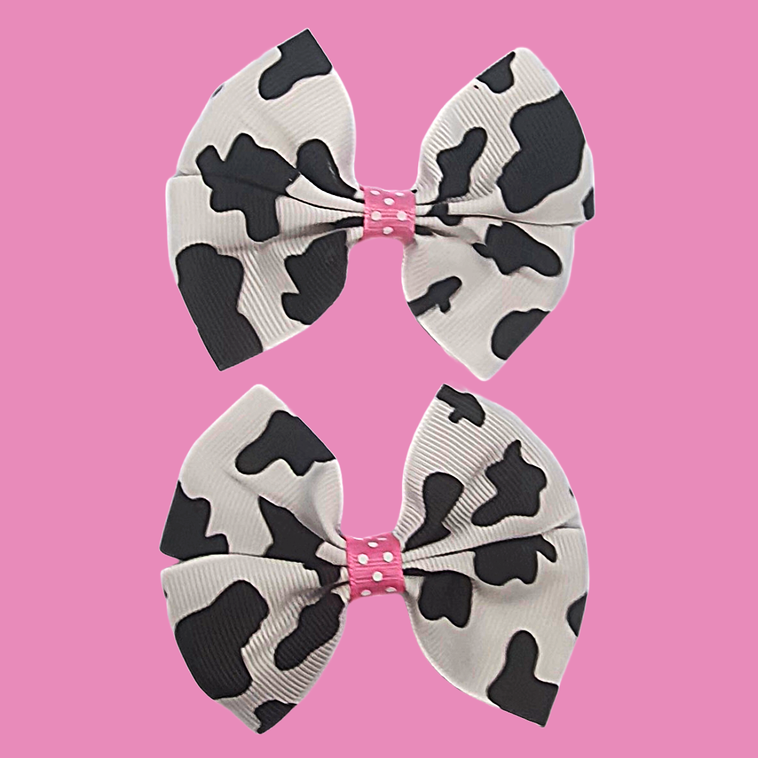 Cow print and pink ribbon bow hair clip set