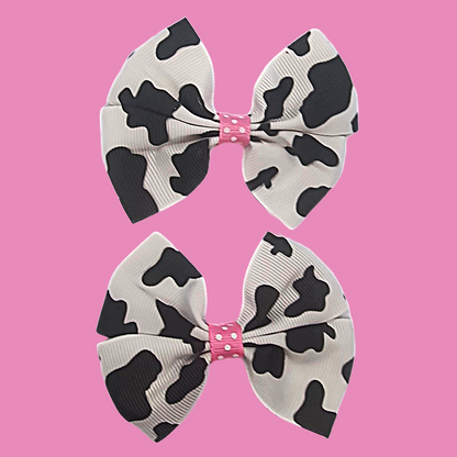 Cow print and pink ribbon bow hair clip set