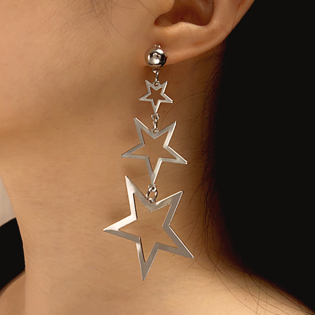 Triple silver celestial star dangly earrings