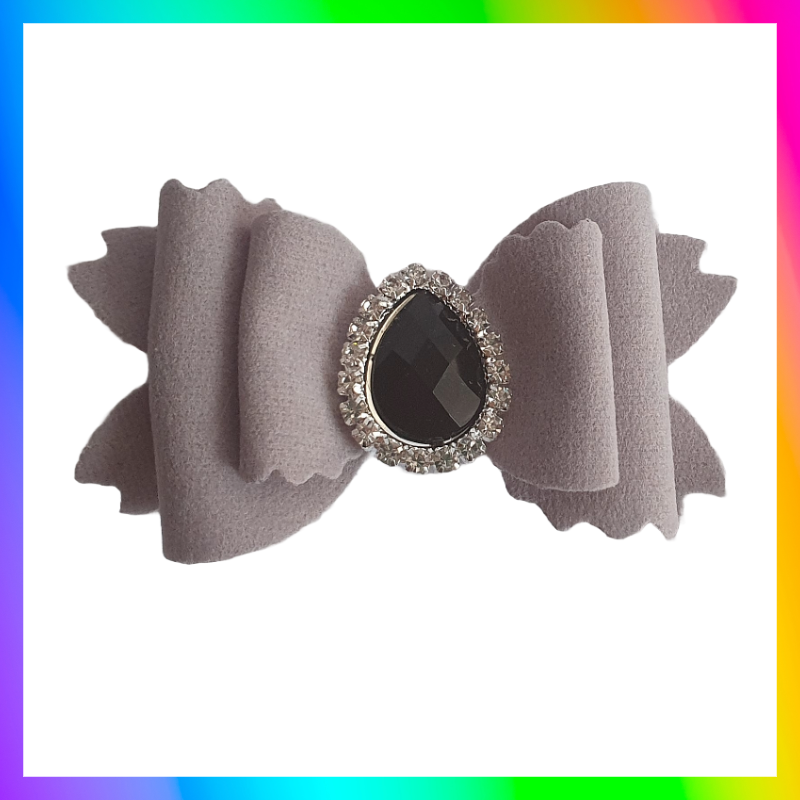 Soft velvet 3" double layered bow with droplet gem surrounded in little clear rhinestones on a crocodile clip comes in variety of colours