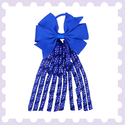 Pair of ribbon hair bow bobbles with polka dot curly ribbon tassels