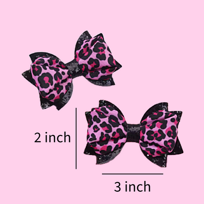 Pink and black leopard animal print ribbon and sparkly black faux leather hair bow pair