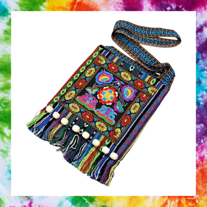 Vintage embroidered boho chic shoulder bag with wooden beads and tassels