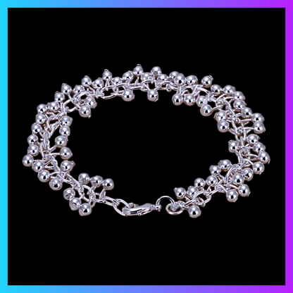 Silver plated cluster charm bracelet