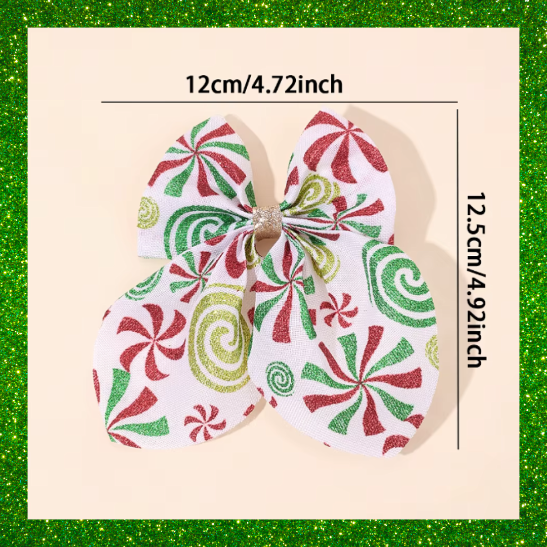 Large festive white hair bows with red green and gold candy swirl design