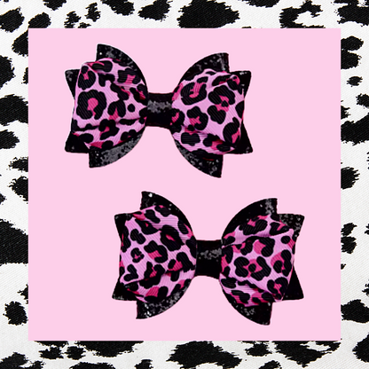 Pink and black leopard animal print ribbon and sparkly black faux leather hair bow pair