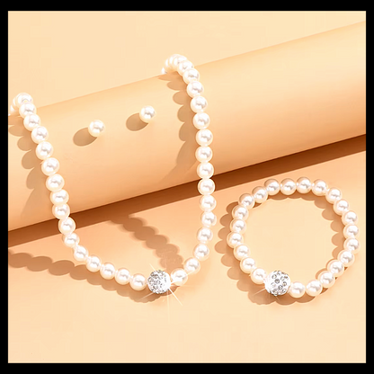 Faux pearl and rhine stone necklace, earring and bracelet sets