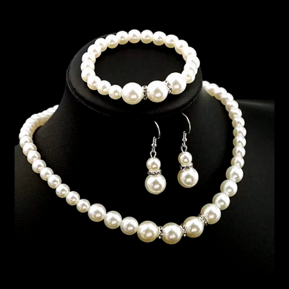 Faux pearl and rhine stone necklace, earring and bracelet sets