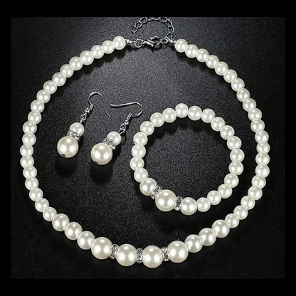 Faux pearl and rhine stone necklace, earring and bracelet sets