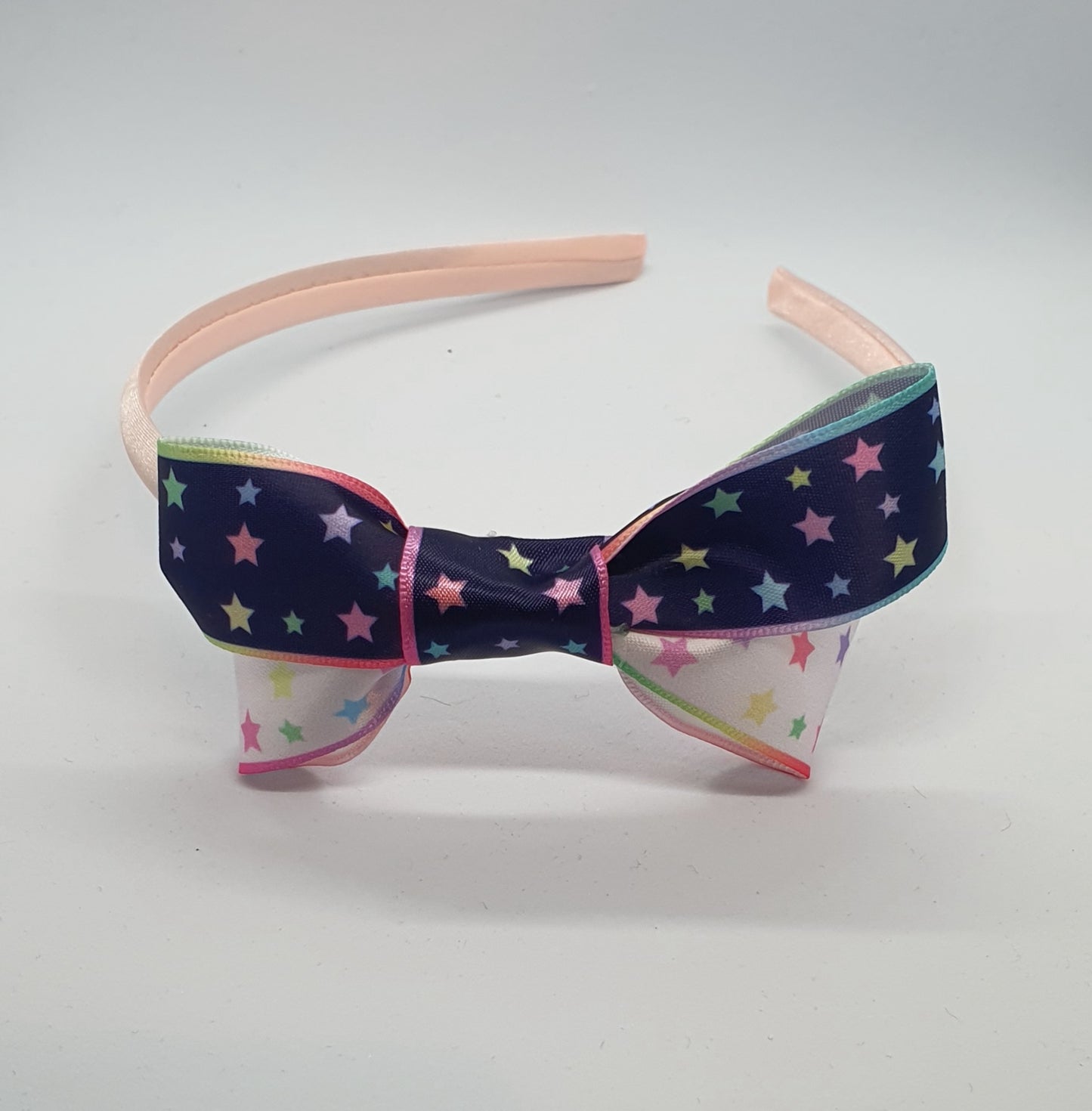 Satin headband with starry ribbon bows