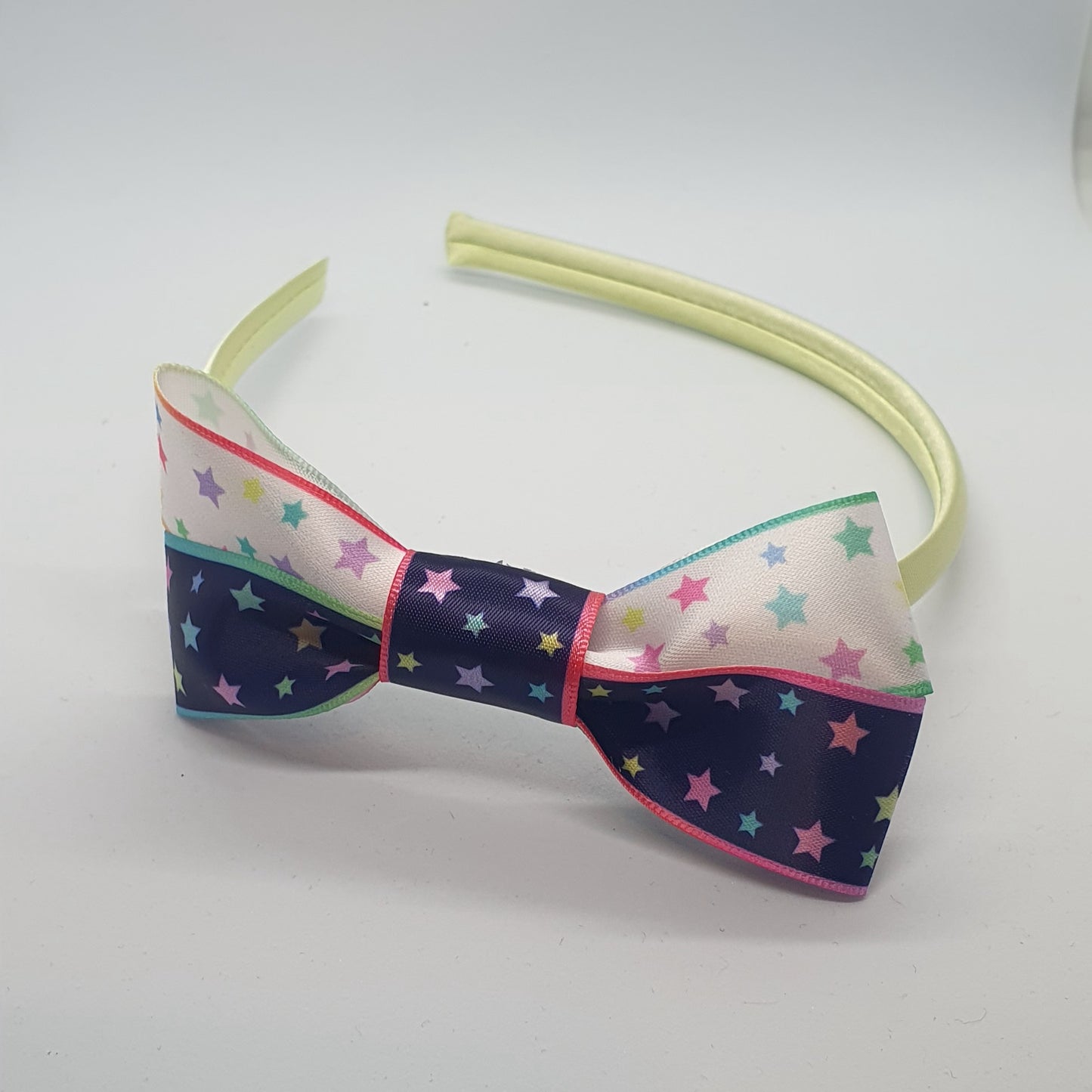 Satin headband with starry ribbon bows