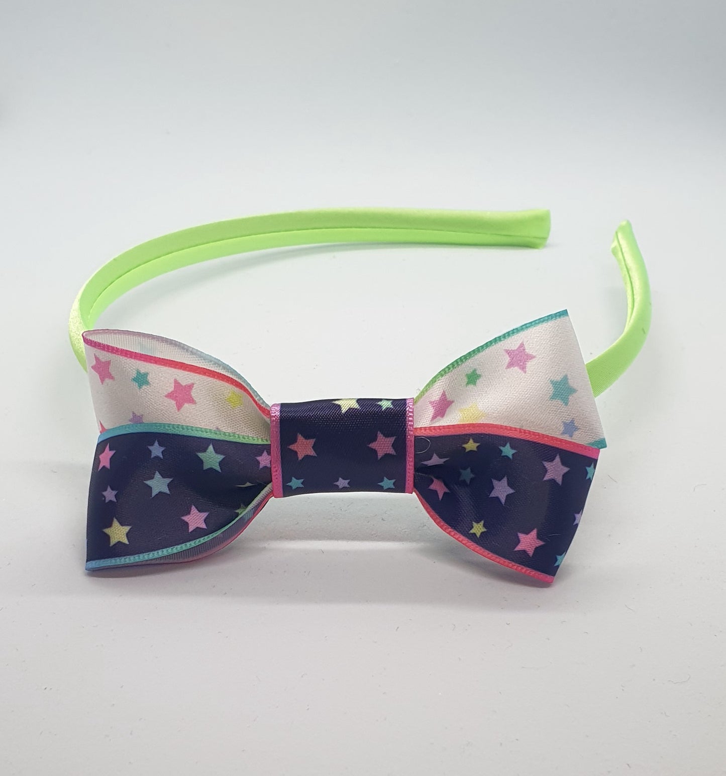 Satin headband with starry ribbon bows