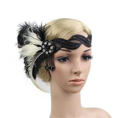 Gatsby 1920's black headband with flower, droplets and black and off-white feathers to the side 
