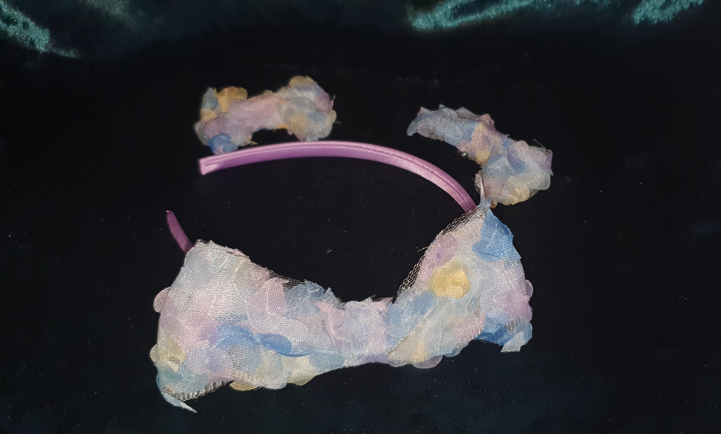 Pretty lilac satin headband With a beautiful large soft ribbon lilac/blue/yellow bow attached with matching pigtail bow clips