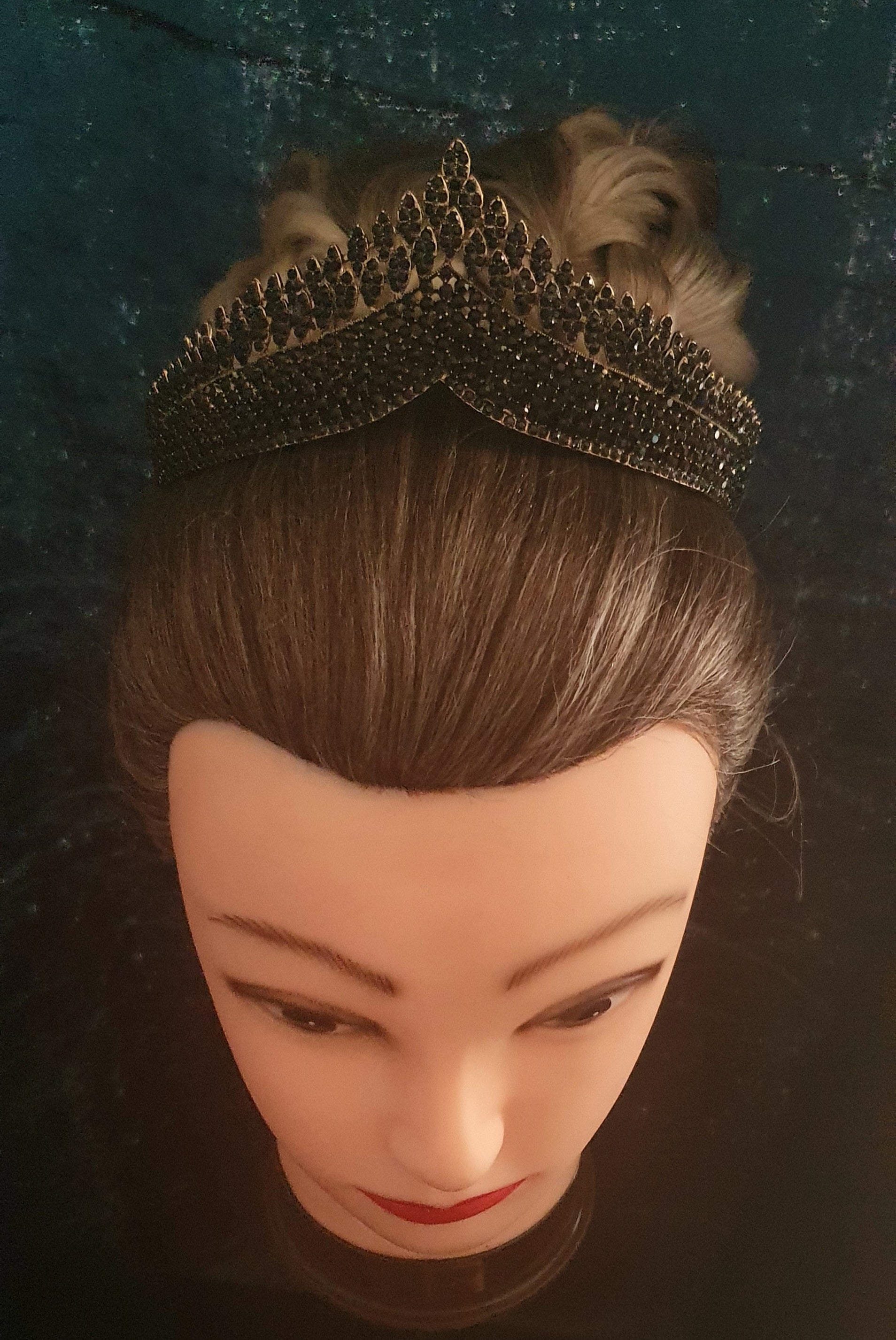 lovely black rhinestone tiara - the whole tiara is covered in small black rhinestone crystals the top half has a leafy type design to it 