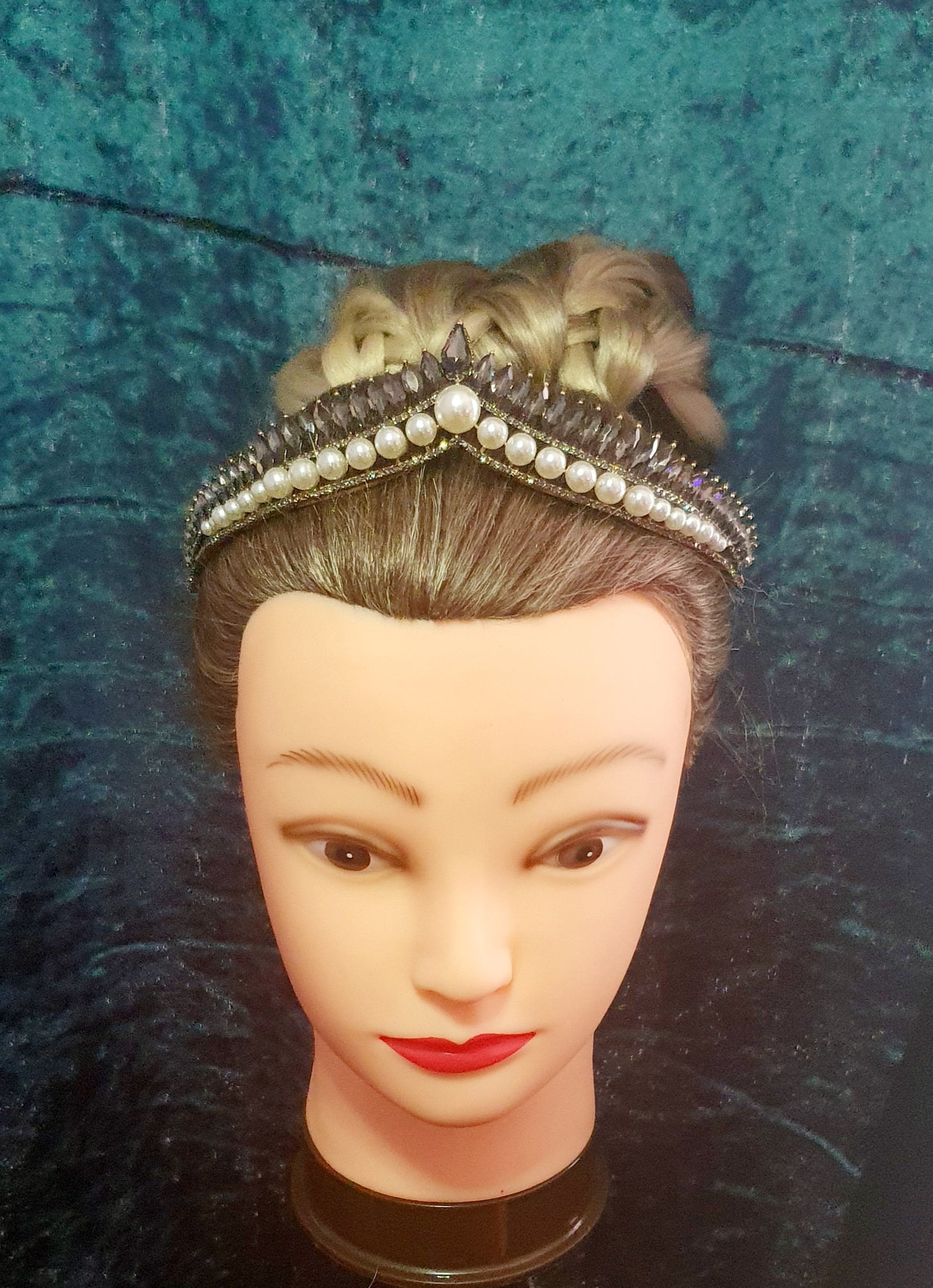 beautiful delicate tiara featuring pearl beads at the bottom and black rhinestone crystals across the top