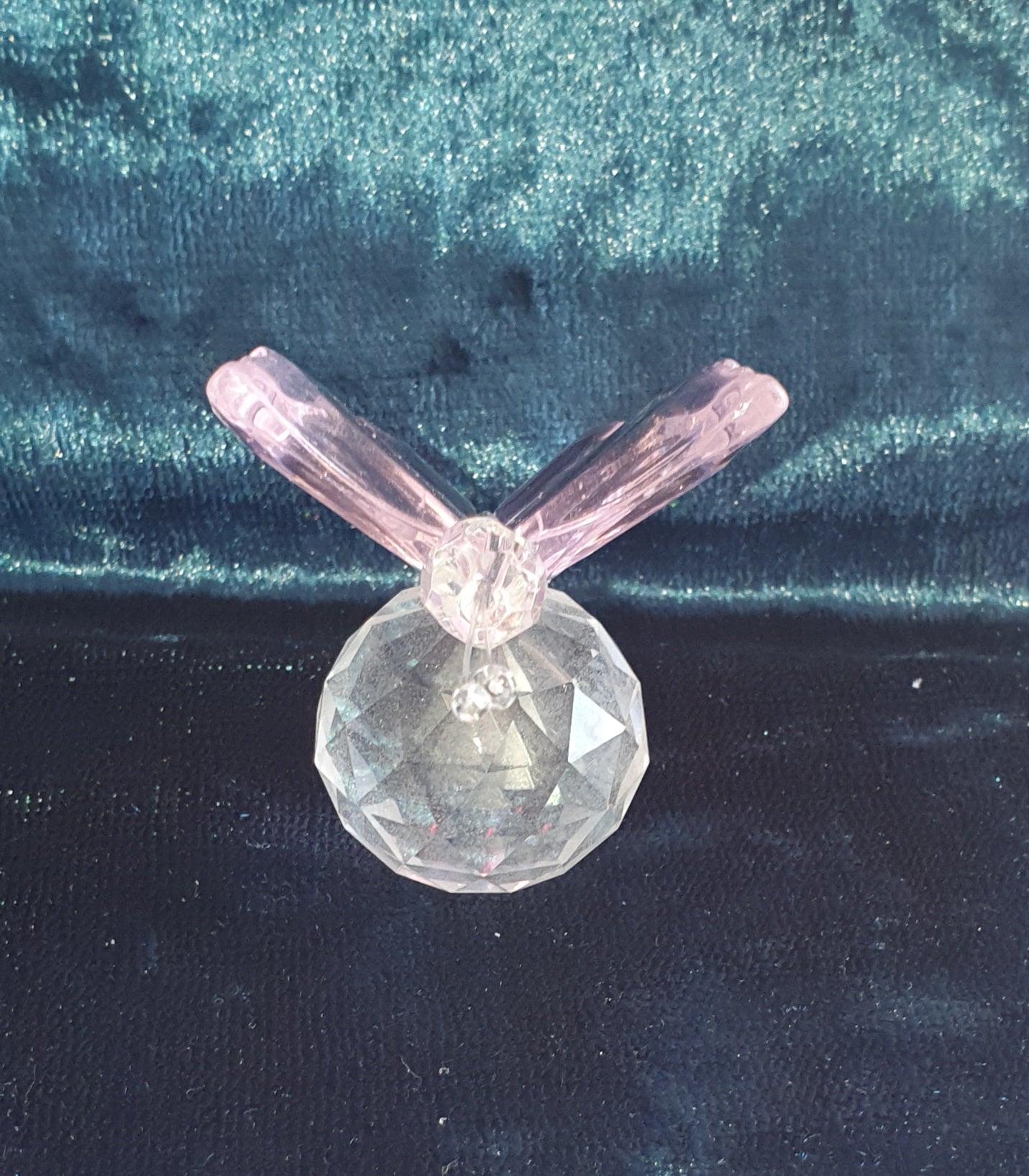 front of pink butterfly crystal figure