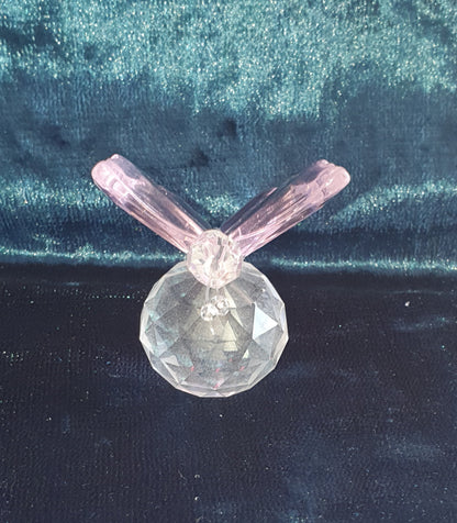 front of pink butterfly crystal figure