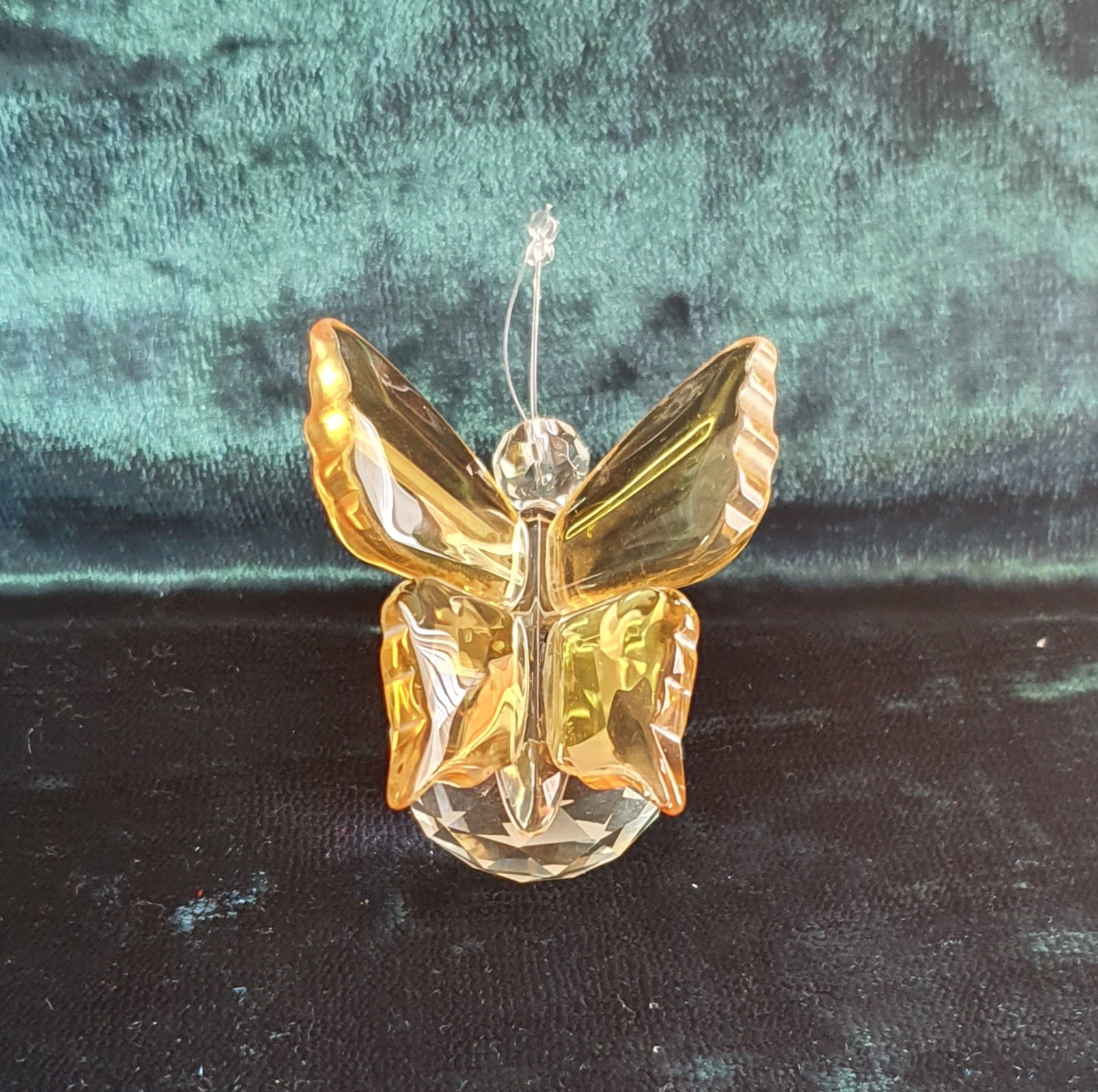 back of yellow butterfly crystal figure