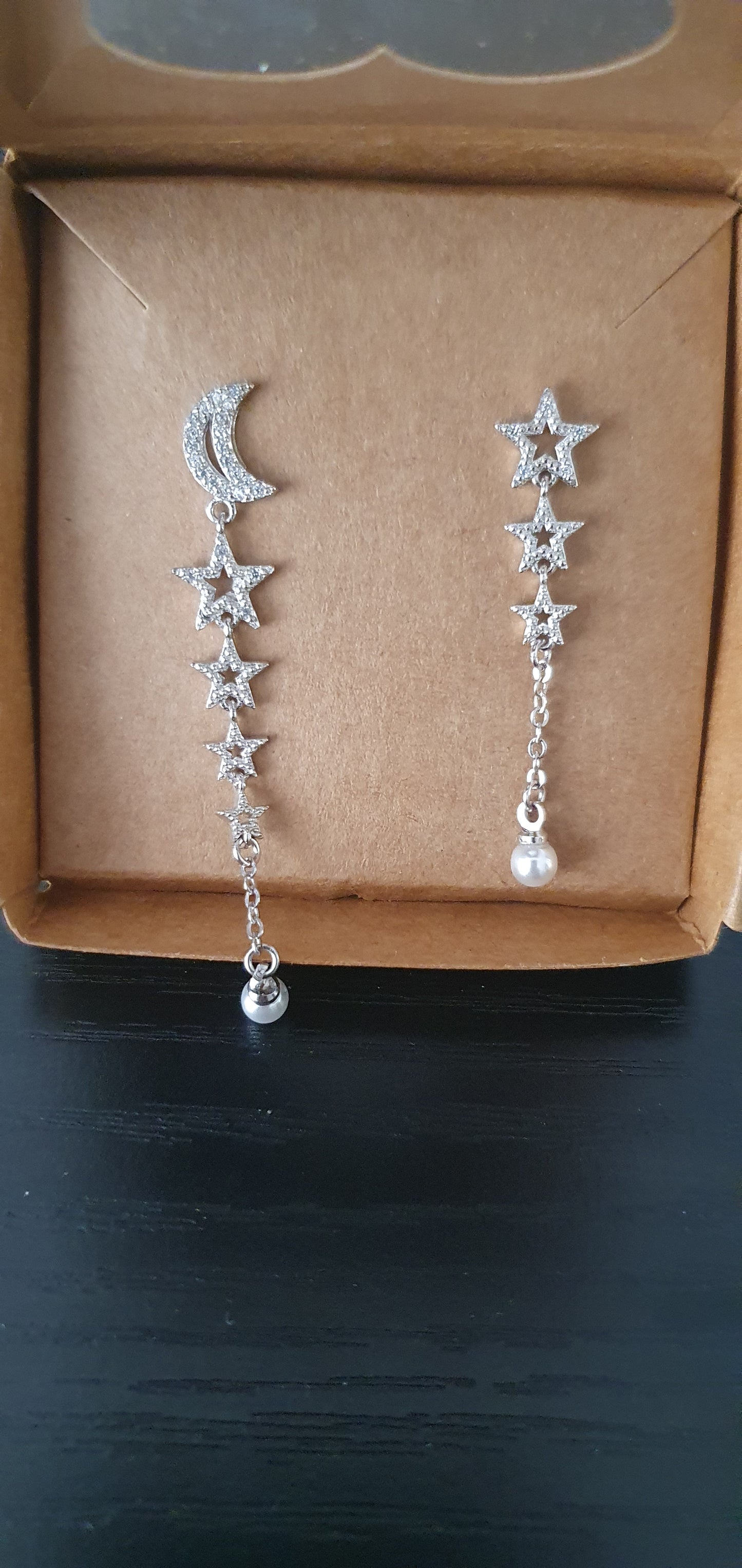 Silver moon and star celestial dangly earrings with pearl and cubic zirconia