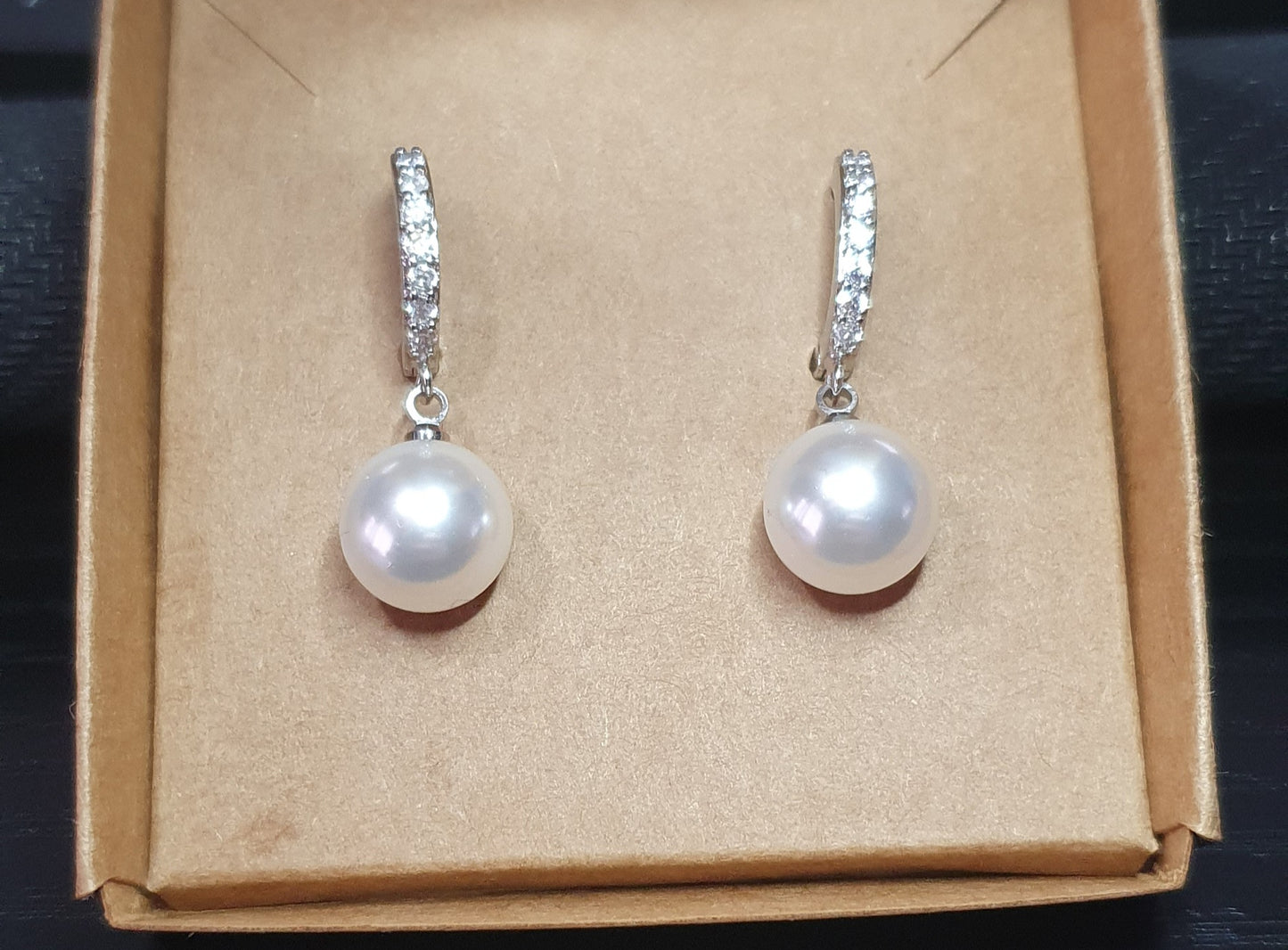 Silver loop earrings with cubic zirconia and freshwater pearl