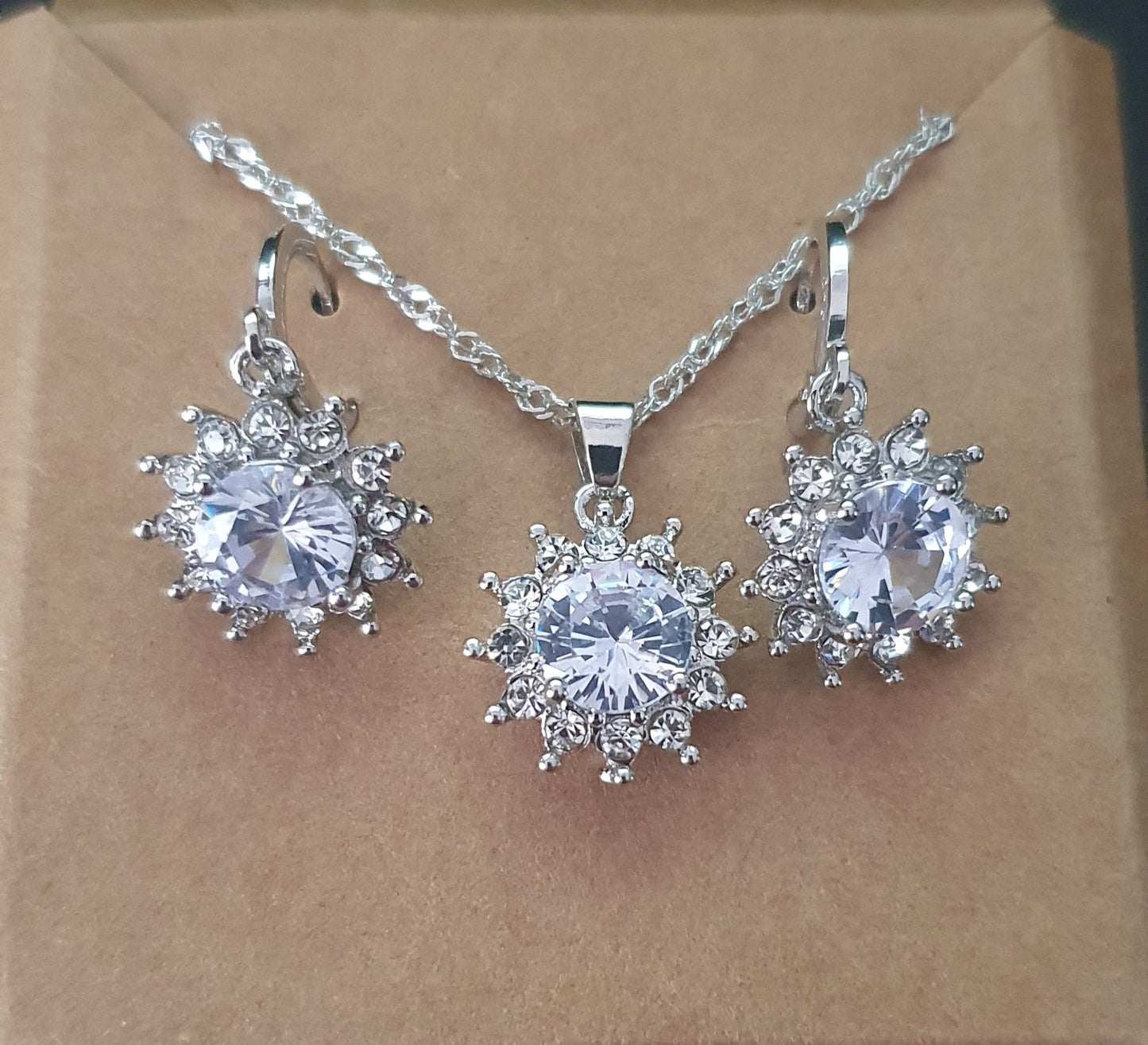 Silver and cubic zirconia sunflower necklace and earring set