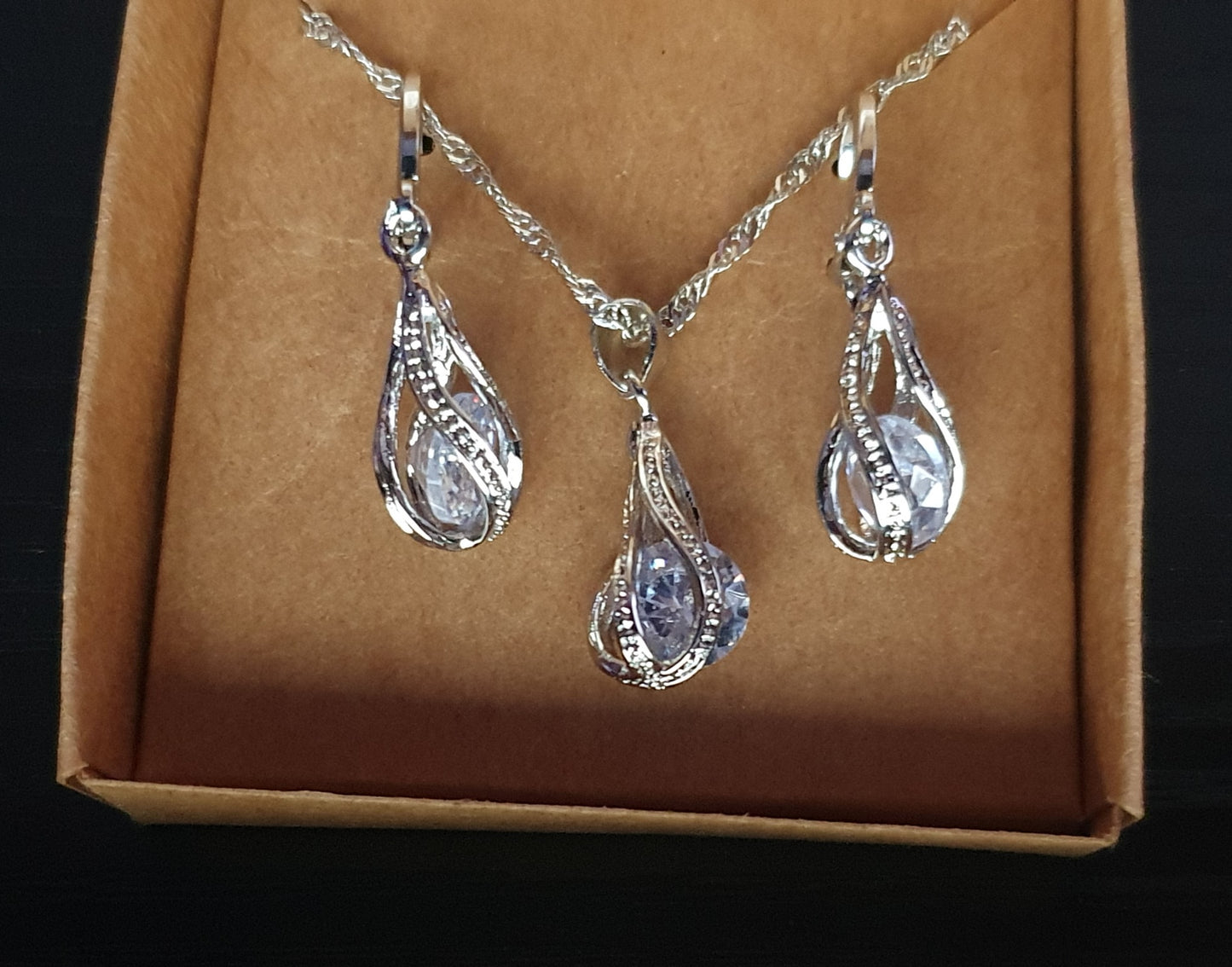 Silver droplet with cubic zirconia necklace and earring set