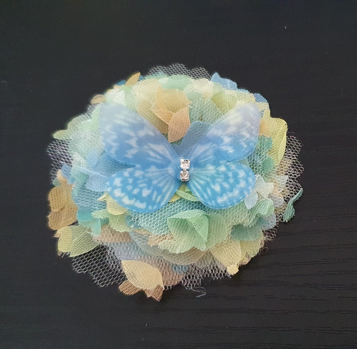 Material flower and butterfly hair clip